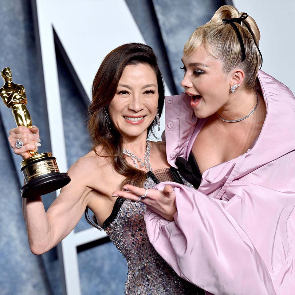 2PBRGNK - Michelle Yeoh, left, winner of the Oscar for lead actress, and Florence Pugh arrive at the Vanity Fair Oscar Party on Sunday, March 12, 2023, at the Wallis Annenberg Center for the Performing Arts in Beverly Hills, Calif.