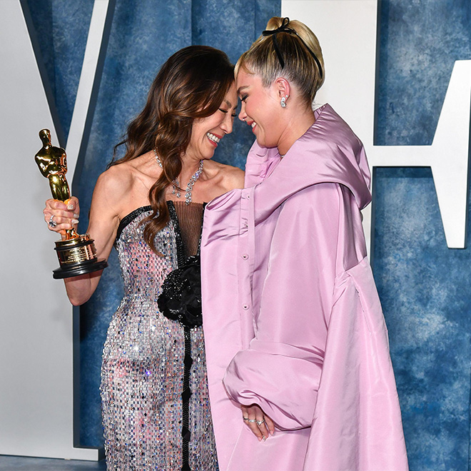 2PBT3N0 -  Michelle Yeoh and Florence Pugh walking on the red carpet at the 2023 Vanity Fair Oscar Party held at the Wallis Annenberg Center for the Performing Arts.