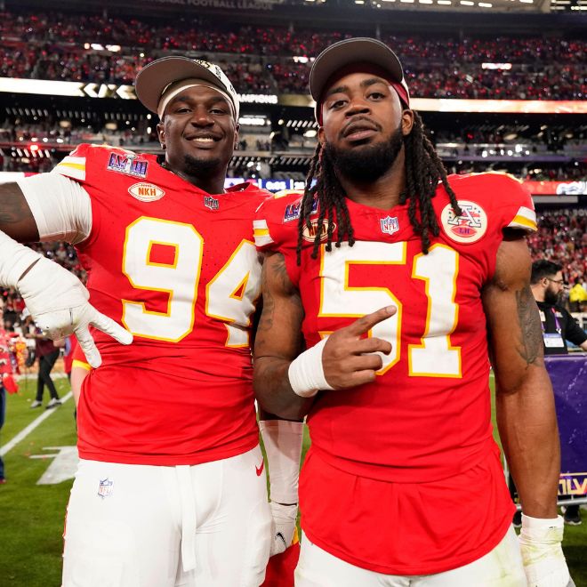 Kansas City Chiefs defensive end Malik Herring (94) and defensive end Mike Danna (51)celebrates after defeating the San Francisco 49ers in overtime of the NFL Super Bowl 