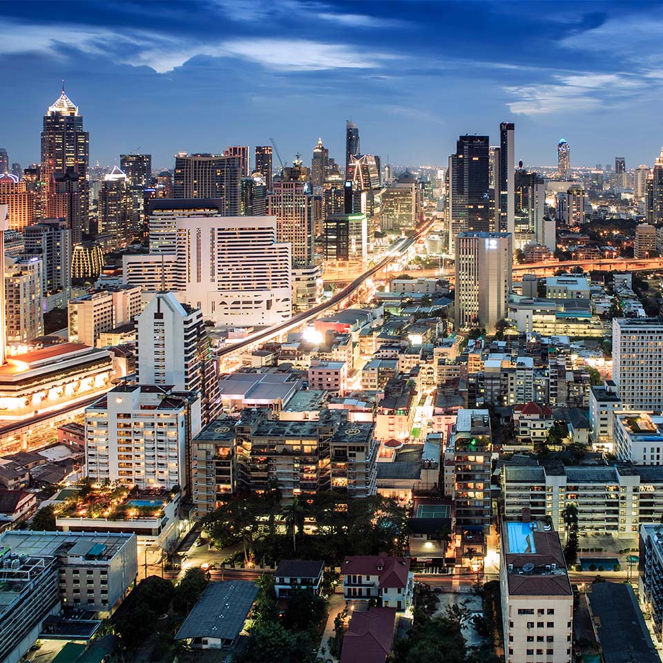 GX30AC - Bangkok city skyline at night - Skytrain train line & main tourist area around Sukhumvit showing Chit Lom and Phloen Chit Road, Pathum Wan District